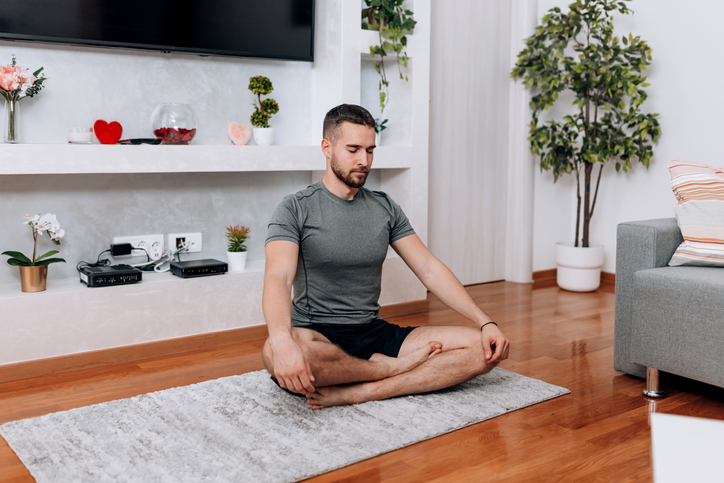 Person stretching on a yoga mat